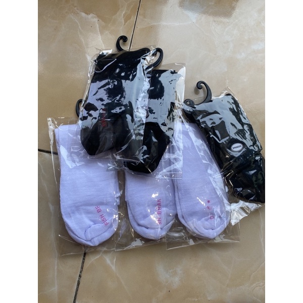 kaos kaki import
