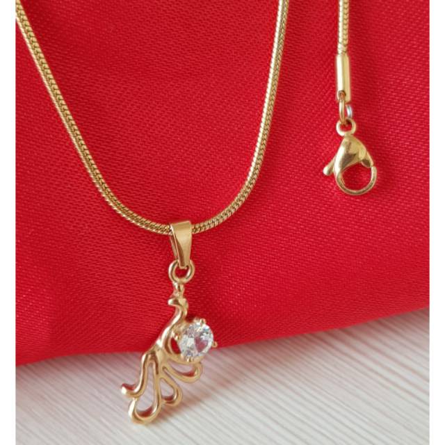 Kalung titanium fashion Burung merak Import