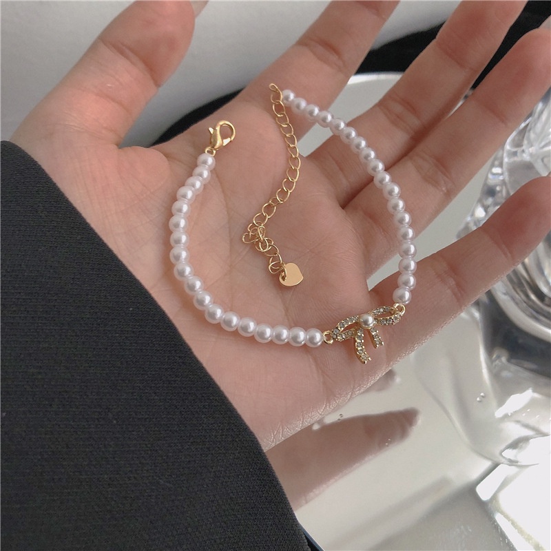 Gelang Tangan Rantai Aksen Mutiara Imitasi Simple Mewah Ala Korea Untuk Wanita