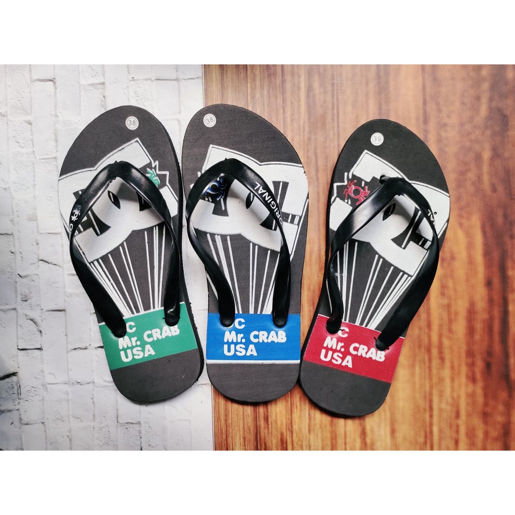 Sandal jepit pria motif DC