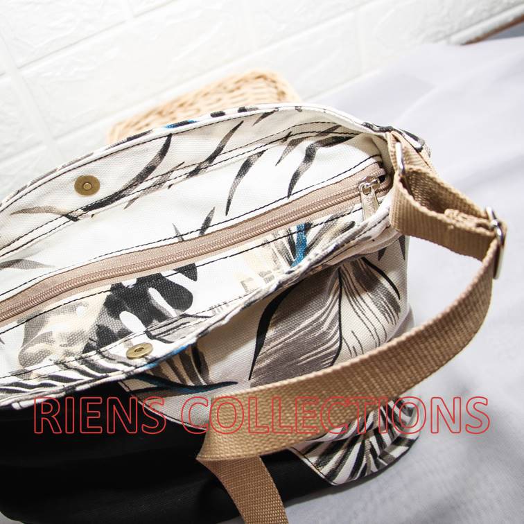 RIENS COLLECTIONS. TAS SELEMPANG SLING BAG KANVAS KOMBINASI FLORAL LATAR PUTIH SLC0105