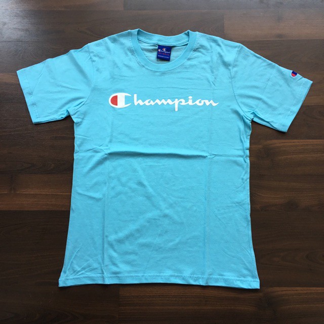KAOS CHAMPION HERITAGE PREMIUM BIRU TOSCA JSD KAOS POLOS  PRIA SC
