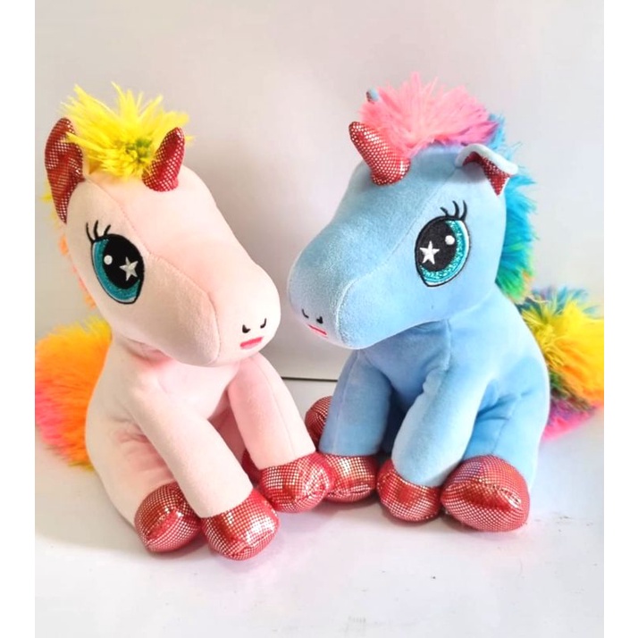 boneka unicorn duduk