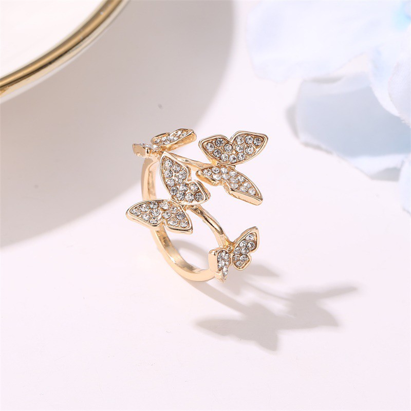 Cincin Desain Kupu-Kupu Aksen Berlian Imitasi Sapphire Warna Silver Rose Gold Adjustable Untuk Wanita