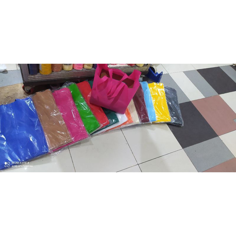 

tas kain spunbond nasi box 25 isi 12 pcs terlaris dan termurah