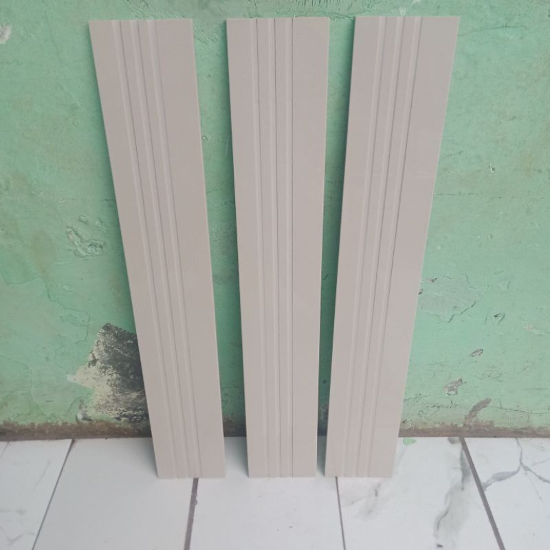 Lis granit tangga ukuran 10x60 cream polos