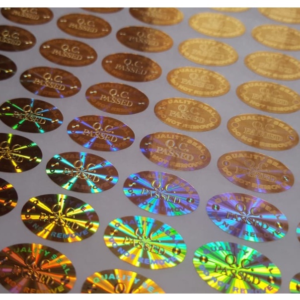 

Stiker Hologram QC Pass Oval Gold Ukuran 1x1.8 cm