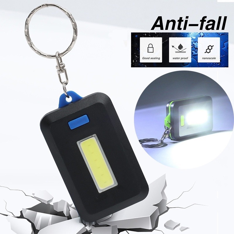 1pc Gantungan Kunci Senter LED COB Mini Portable Multifungsi Anti Air 3 Mode Warna Acak