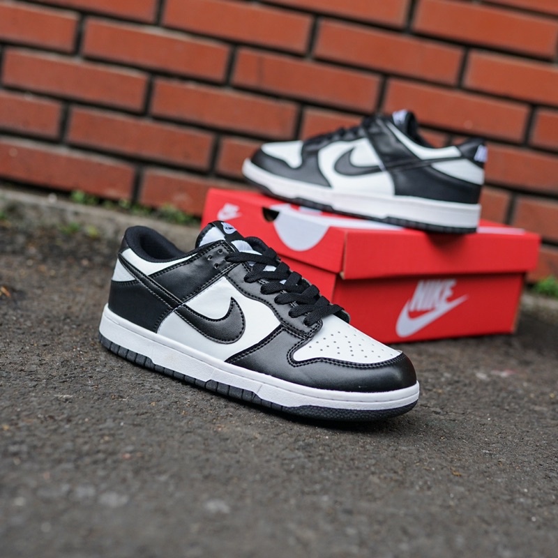 white and black low dunks