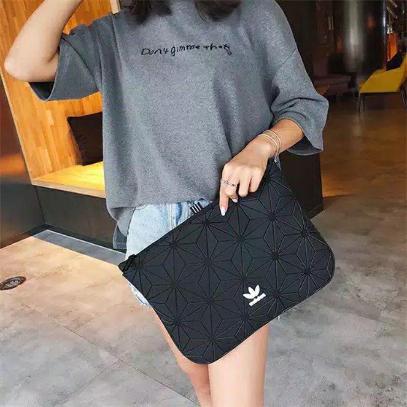 tas x Issey Miyake cluctbag handbag