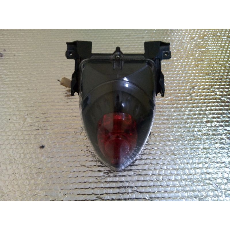 lampu belakang / lampu rem Yamaha Fino ORI