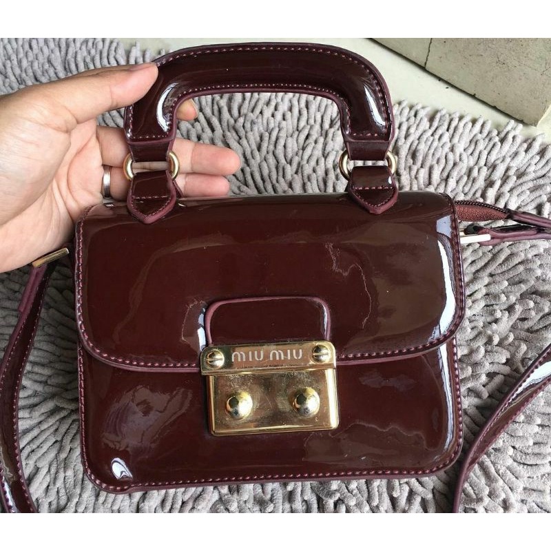 preloved tas miumiu mini sling bag