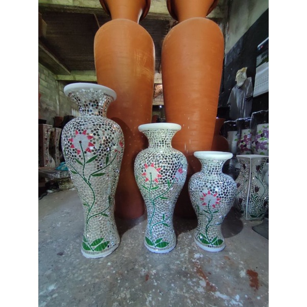 vas guci gerabah tempel kaca