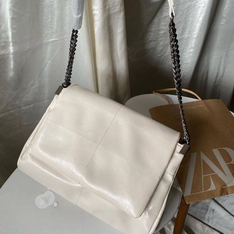 ZRA rocker shoulder bag with flap