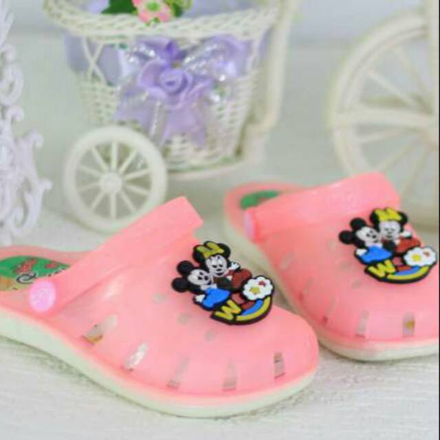 pink and blue crocs