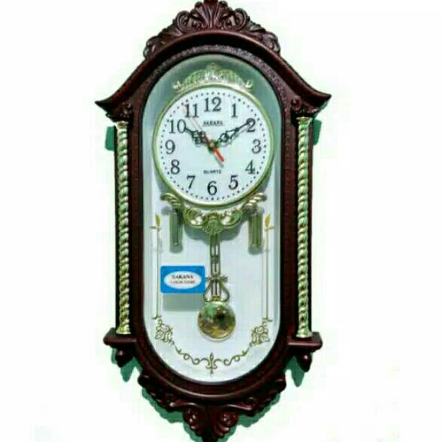 JAM DINDING BANDUL UK.BESAR 90x35cm/ JAM DINDING LONCENG BUNYI TIAP JAM MERK SAKANA MODEL KLASIK