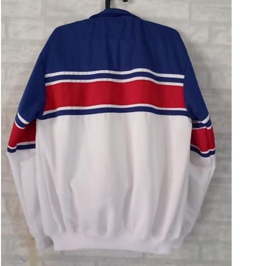 jaket traktop biru/ putih Lis merah