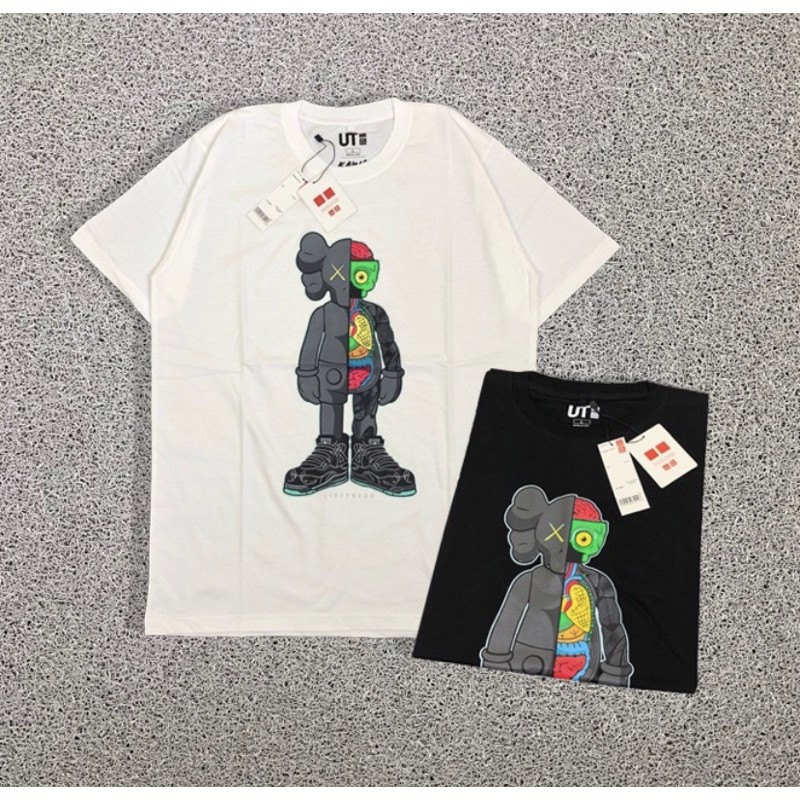 T SHIRT KAOS KAWS X UNIQLO ANATOMY PARODY HITAM DAN PUTIH PREMIUM TERLARIS TERMURAH FREE STICKER