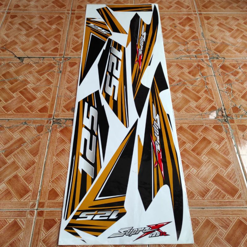 Striping sticker supra x 125 grafis gold variasi motor modifikasi