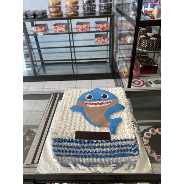 

KUE TART LAPIS SURABAYA GAMBAR BABY SHARK UKURAN 22 CM