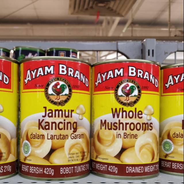 

Jamur kancing diawetkan dalam larutan garam Ayam Brand