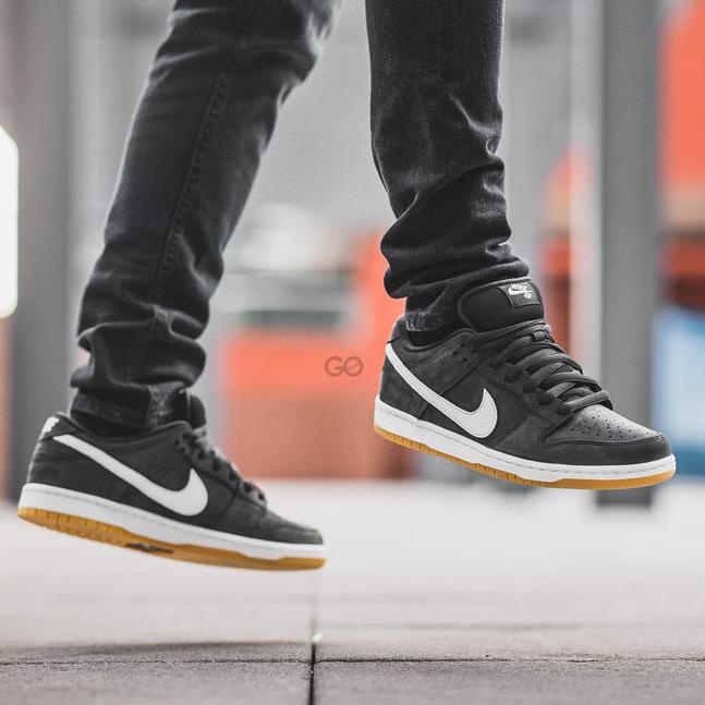 orange black and white dunks