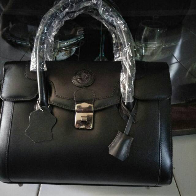 Tas giat bahan kulit asli