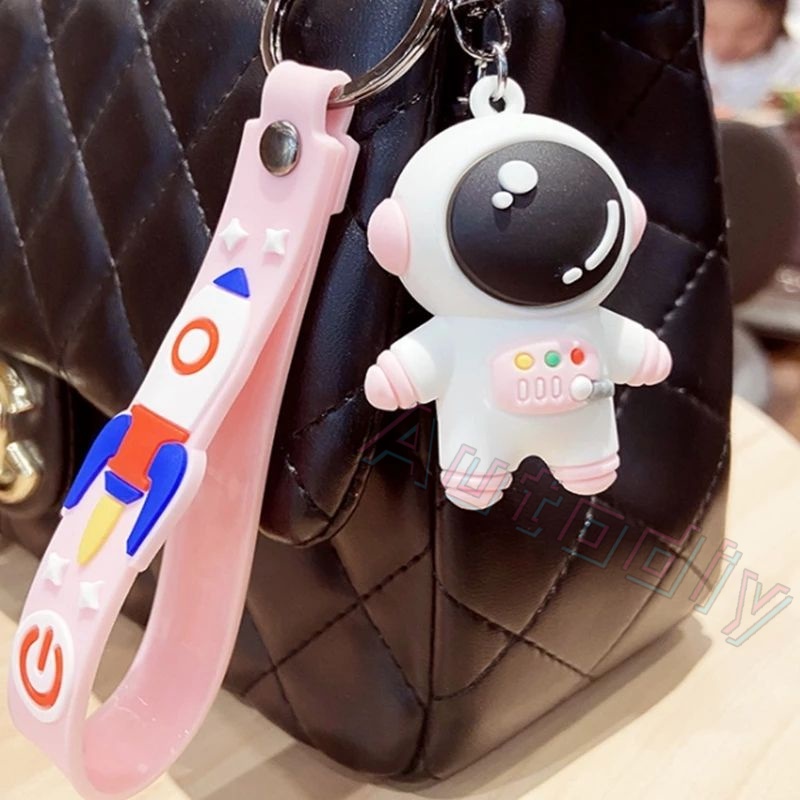 Kartun Luar Angkasa Astronot Roket Planet Gantungan Kunci Lucu 3D Spaceman Figure Lanyard Cosmonaut Keyrings Silicone Trinket Props Bag Doll Key