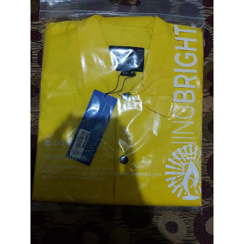 yellow coach jacket shining bright