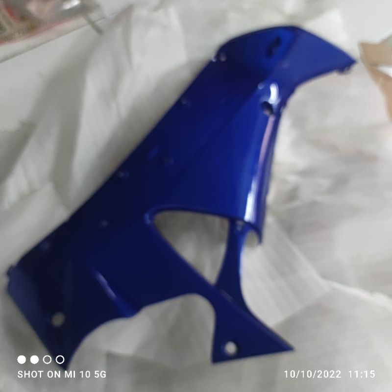 Cover M/P Supra X125 biru kiri. 64450-KPH-700FMT