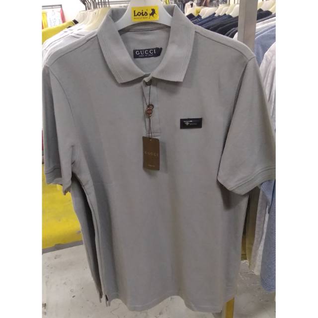 Kaos Polo merk GUCCI Warna Silver