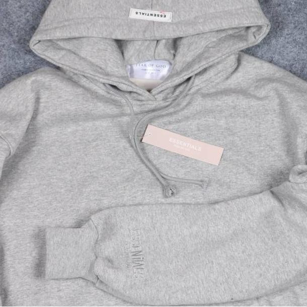 fear of god essentials cream hoodie