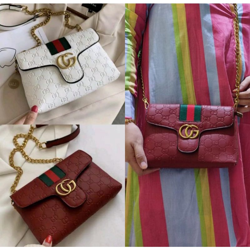 Tas Makassar clutch