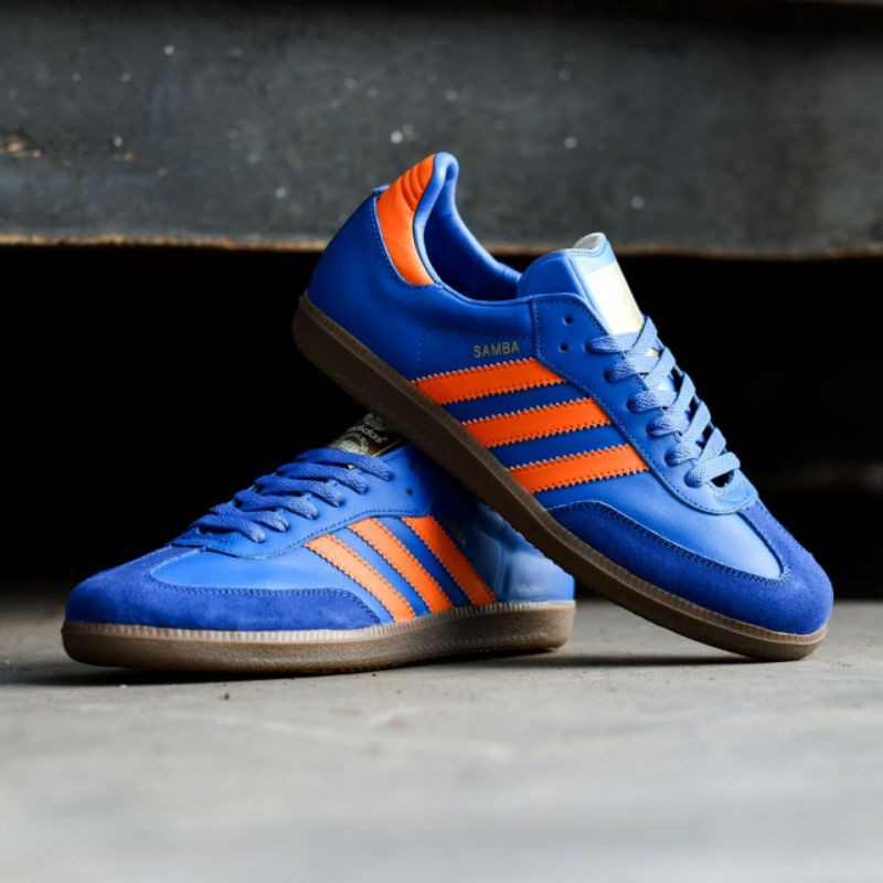 blue and orange adidas samba