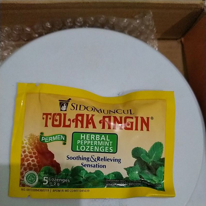 permen tolak angin sachet isi 5butir,per sachet.