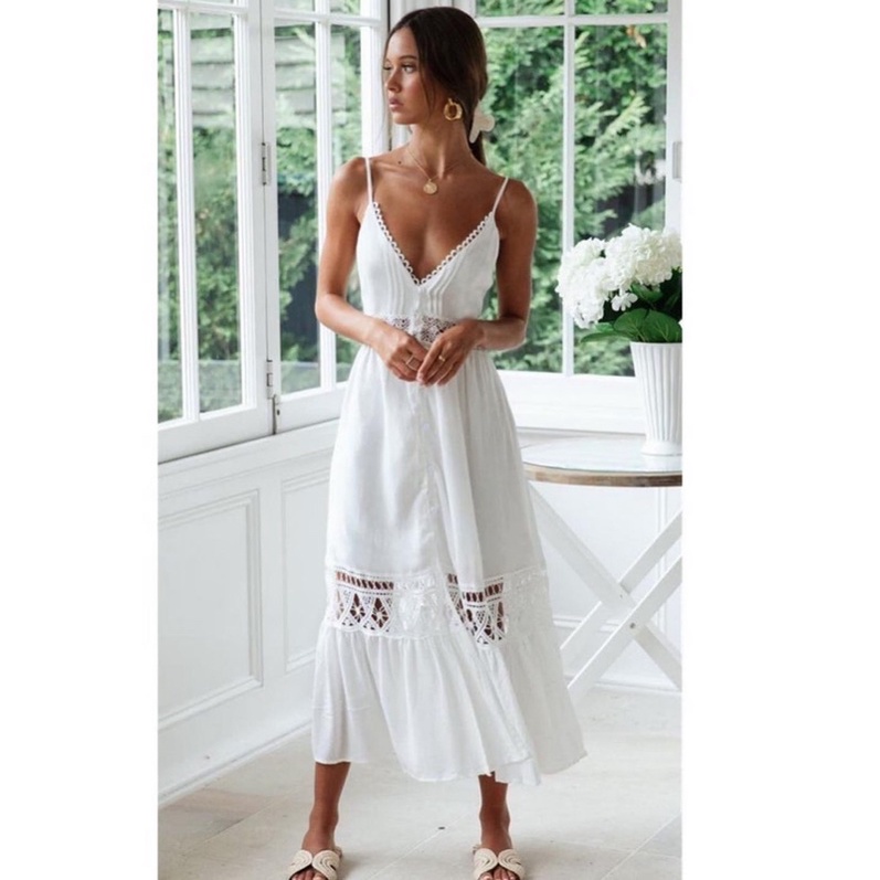 dress pantai casual putih dengan detail lasercut halus flare midi dress CODE LIU-109