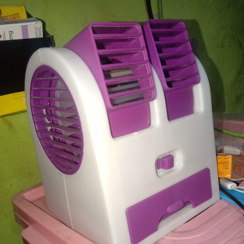 AC mini portable second masih berfungsi dengan baik