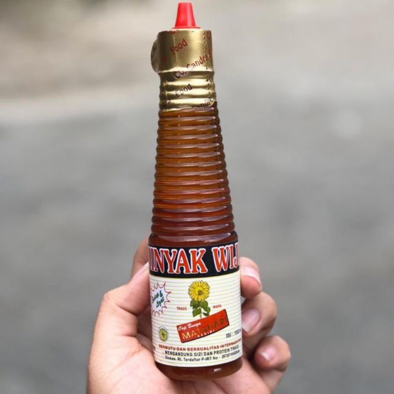 

Minyak Wijen 150 ml cap Bunga Matahari