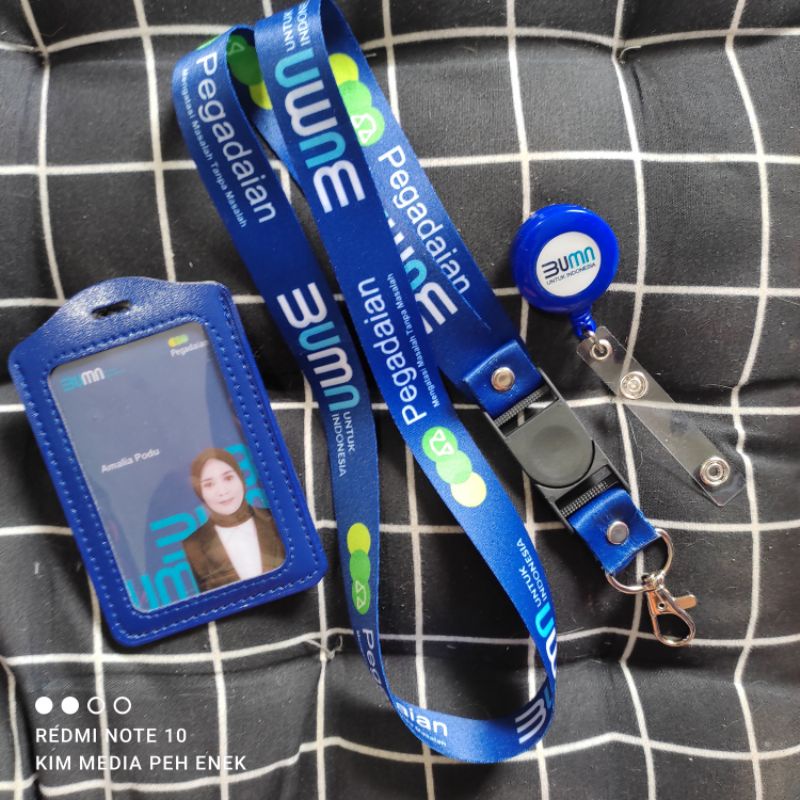 

Lanyard id BUMN PEGADAIAN dongker Printing Terbaru 2021/ Gantungan id card PEGADAIAN BUMN-Satuan-Ready