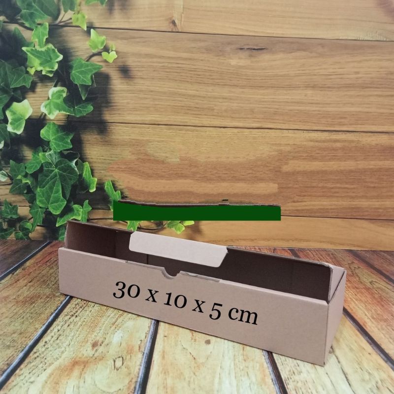 

kardus 30 x 10 x 5cm..Die Cut