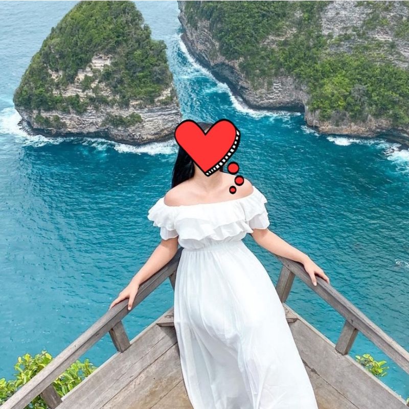 dress pantai putih