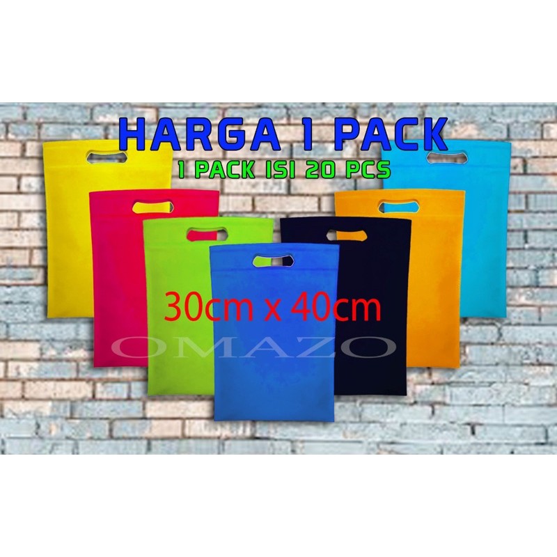 

TAS SPUNBOND/GOODIE BAG/TOTEBAG MODEL OVAL UKURAN 30CM X 40CM