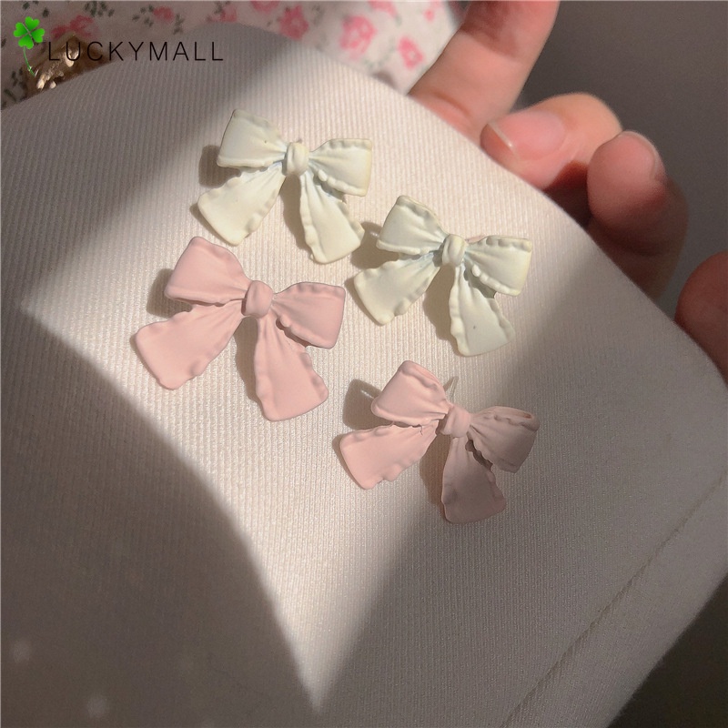 Anting Stud Desain Pita Bahan Plastik Warna Solid Gaya Korea Untuk Wanita