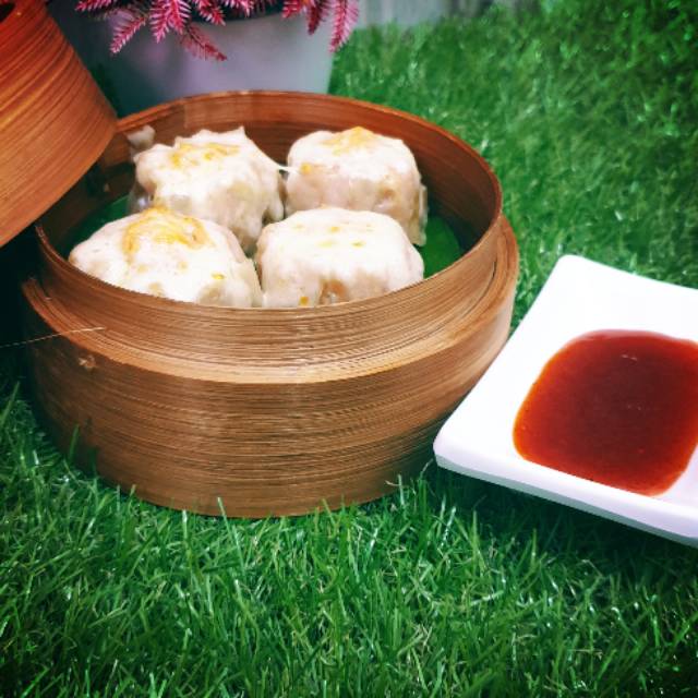 

Dimsum toping keju mozarela frozen ( isi 10 Pcs )