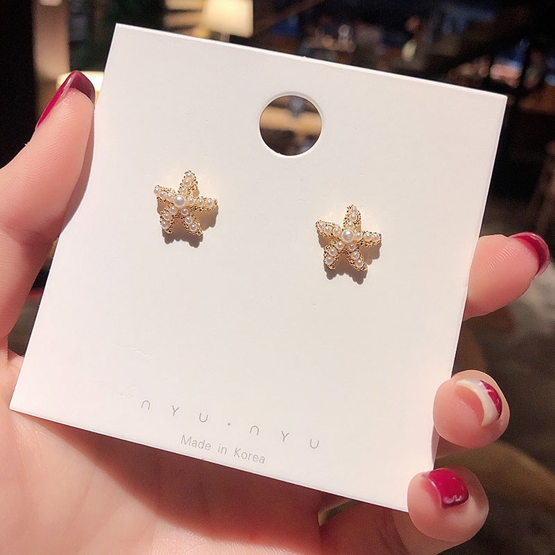 Anting Stud Desain Bintang Laut Aksen Mutiara Bahan S925 Silver Untuk Wanita