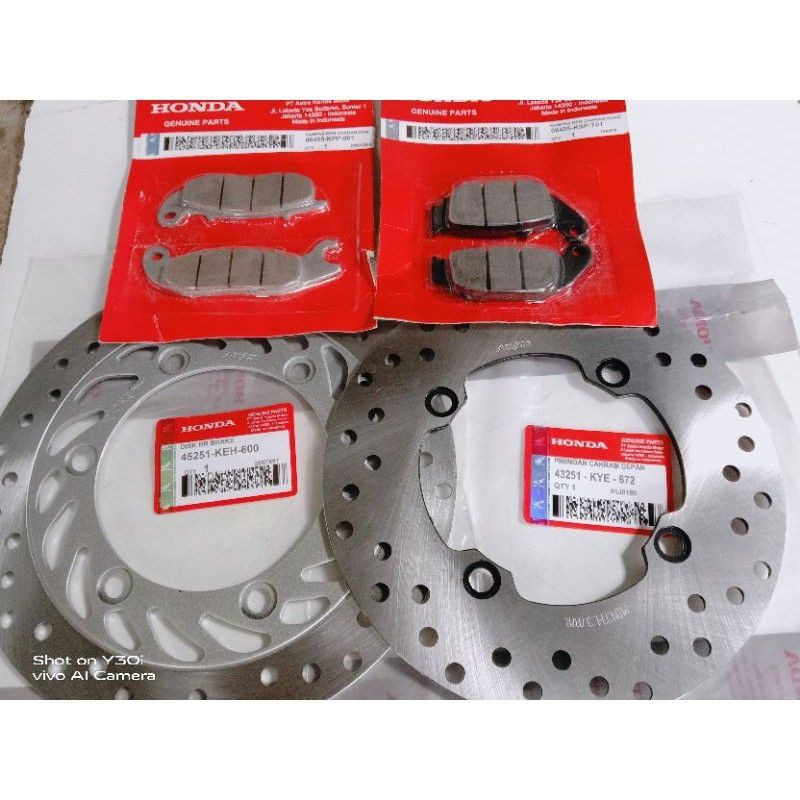 piringan cakram depan belakang+1 set kampas rem megapro new.Tiger