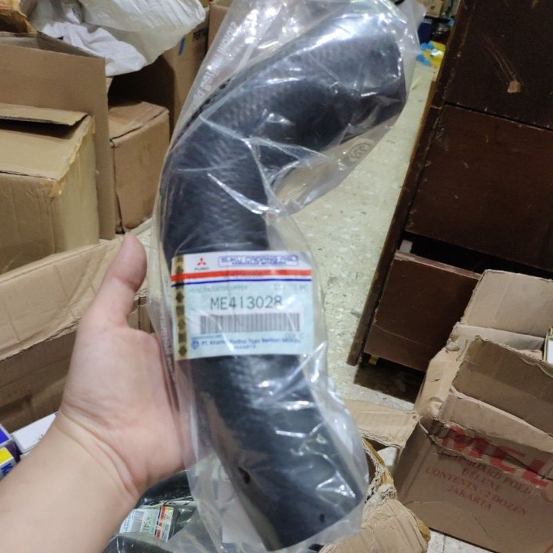 selang radiator atas canter 110ps 125 ps ori