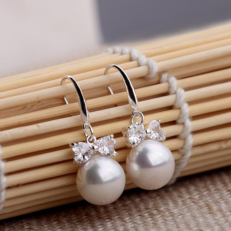 Korean Version of the Zircon Bow Pearl Earrings Female Lovely Ornament