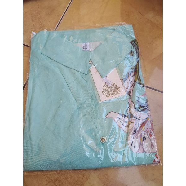 kemeja motif shellasaukia