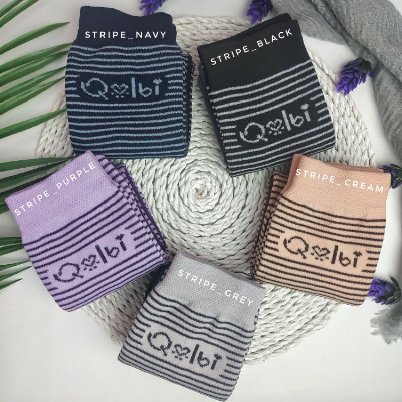 Kaos kaki motif by Qolbi